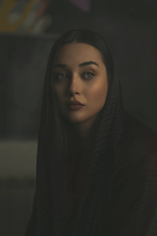 Portrait of a woman in low cinematic light
