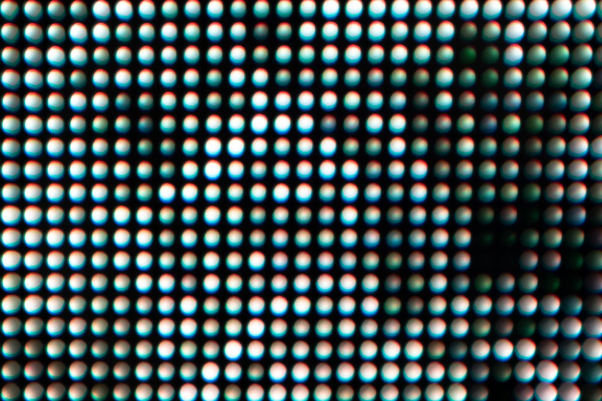 Macro close-up of a display's RGB pixels — the dots that make up a 4K picture